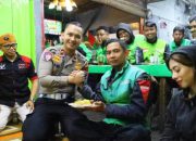 Peringati HUT Lalu Lintas Bhayangkara ke-71, Satlantas Malang Kota Makan Tumpeng Bersama Ojol
