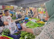 1. BRI Dukung Digitalisasi Pasar Tradisional, Pedagang Keputran Didorong Gunakan QRIS